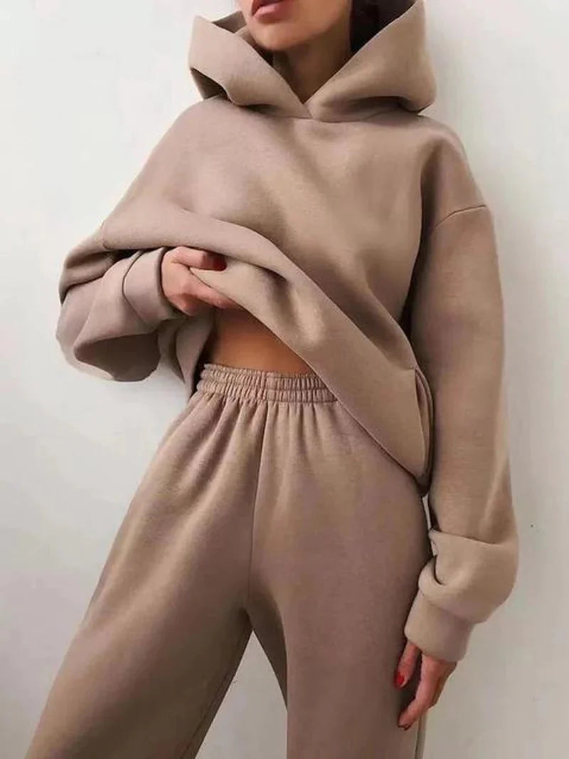 Clarivae two-piece tracksuit set featuring a stylish hoodie and matching sweatpants in a casual athletic style.