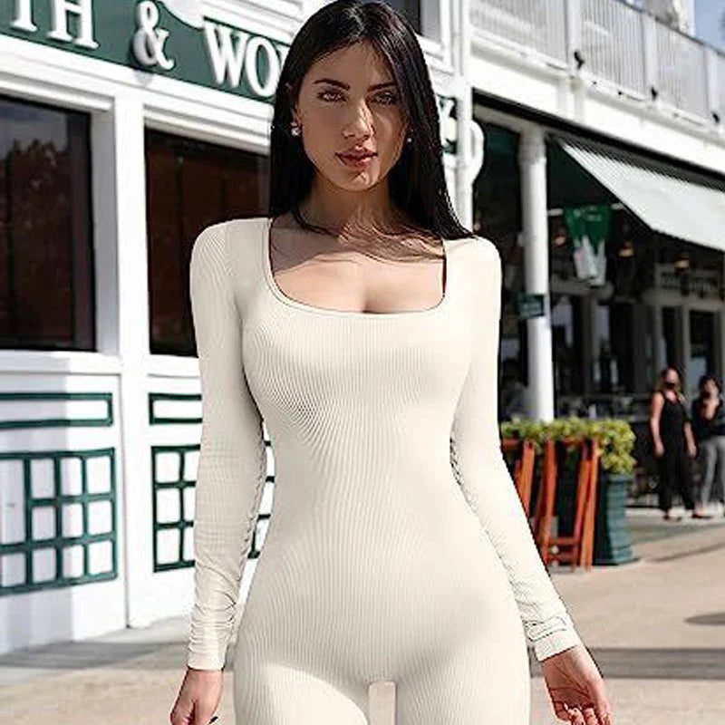 Women’s seamless long-sleeve yoga jumpsuit by Clarivae, shown in a fitted, stretchy fabric ideal for active wear and yoga practice.