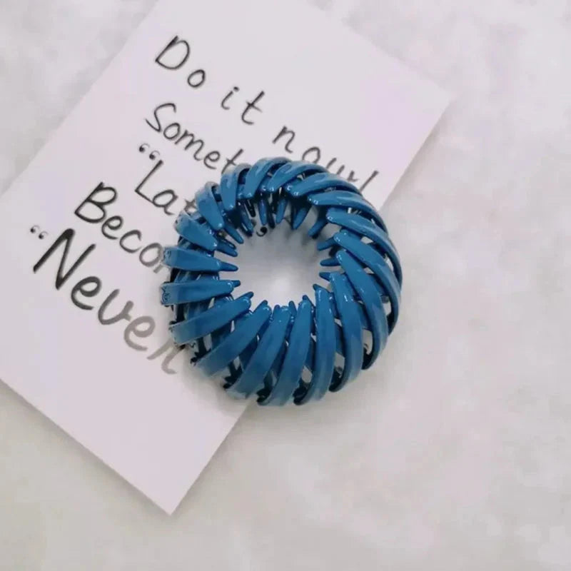 Bird nest shaped ponytail hair clip by Clarivae, a magic lazy braider hairpin for quick and effortless hairstyles.