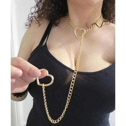 Adjustable Clarivae heart O-ring necklace with punk style Cuban chain, Y-style lariat, key, and heart lock pendant.