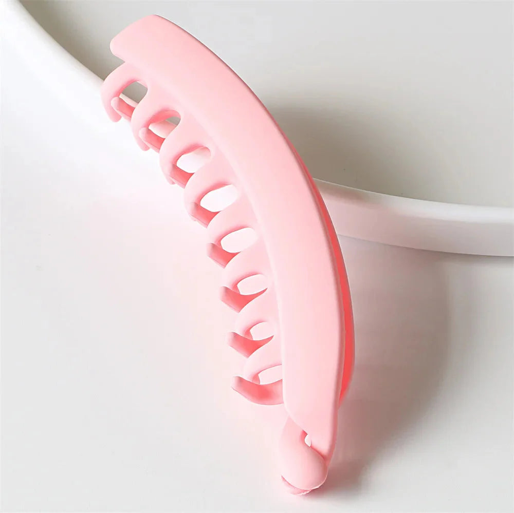 Frosted solid color banana hair clips by Clarivae, stylish ponytail barrettes and hair claws for women.