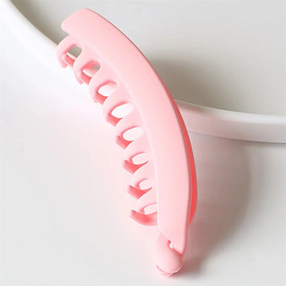 Frosted solid color banana hair clips by Clarivae, stylish ponytail barrettes and hair claws for women.