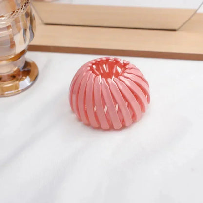 Clarivae bird nest shaped ponytail hair clip, a unique hairpin for creating effortless, stylish ponytail hairstyles.