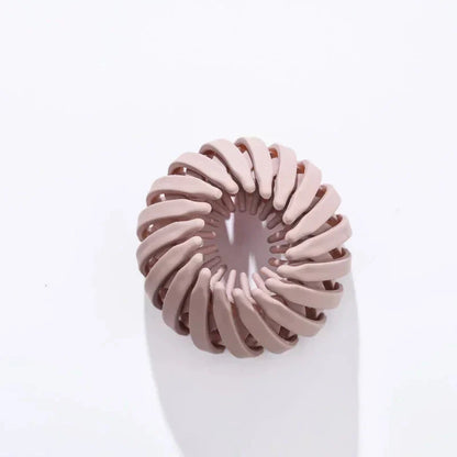 Clarivae bird nest-shaped ponytail hair clip with a lazy braid design, perfect for effortless, stylish hairstyles.