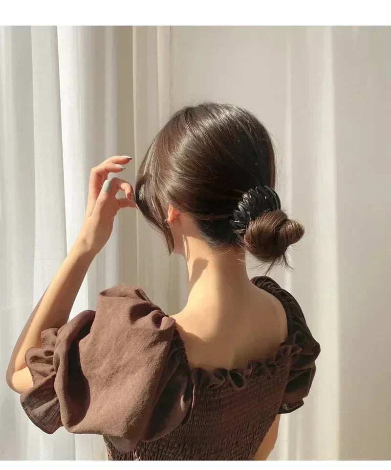 Clarivae bird nest shaped ponytail hair clip with a lazy braid design, perfect for effortless hairstyles and secure hair styling.