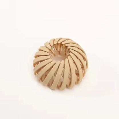 Clarivae bird nest shaped ponytail hair clip with a playful design, perfect for effortless hairstyles and lazy braids.