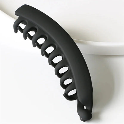 Clarivae frosted solid color banana hair clips, stylish ponytail barrettes and hair claws for women in various colors.