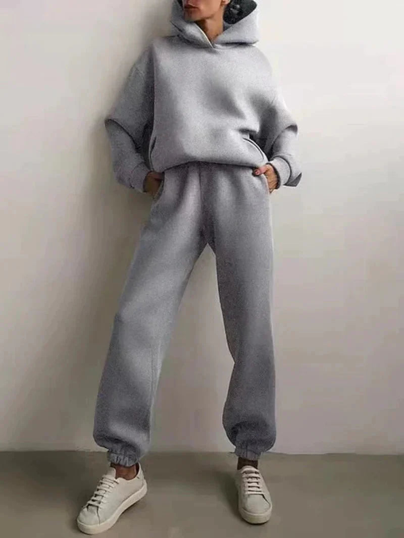 Clarivae two-piece tracksuit set with matching hoodie and joggers, stylish casual activewear for comfortable workouts.