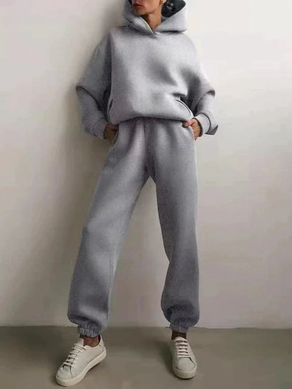 Clarivae two-piece tracksuit set with matching hoodie and joggers, stylish casual activewear for comfortable workouts.