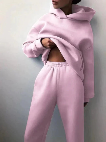 Clarivae two-piece tracksuit set with matching jacket and pants, comfortable athletic wear for casual or workout use.