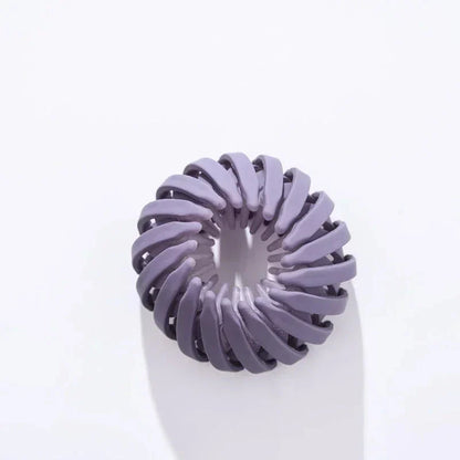 Clarivae bird nest shaped ponytail hair clip with a magic lazy braider design, ideal for effortless hairstyles and secure hair hold.