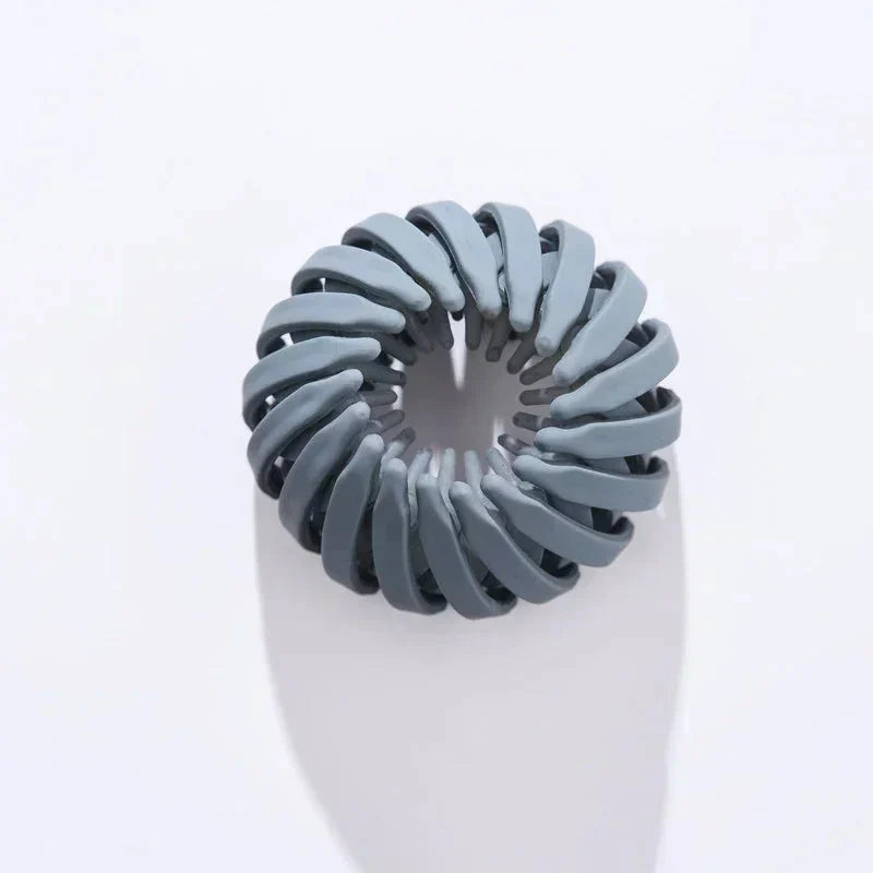 Clarivae bird nest-shaped ponytail hair clip, a playful hairpin for easy, stylish ponytail hairstyles.