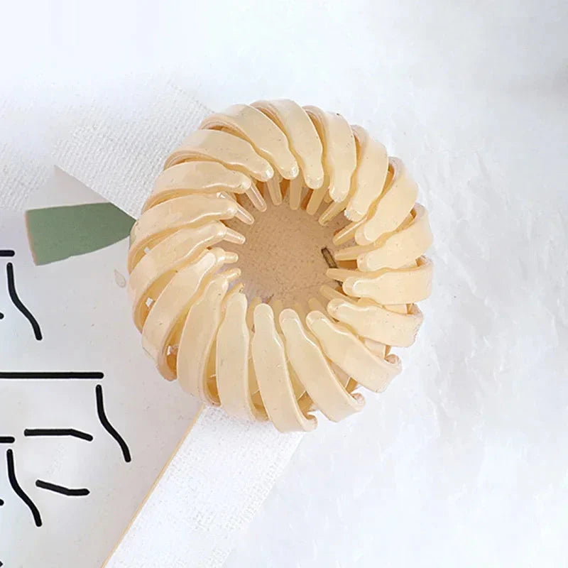 Clarivae bird nest-shaped ponytail hair clip, a magic lazy braider hairpin for easy, stylish hairstyles.